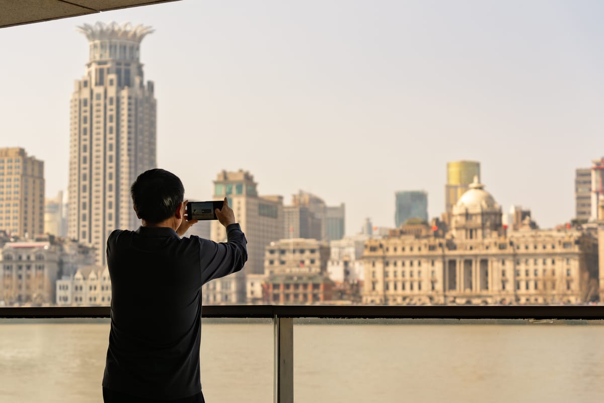 Nature Photographer in Shanghai, Camera in Hand